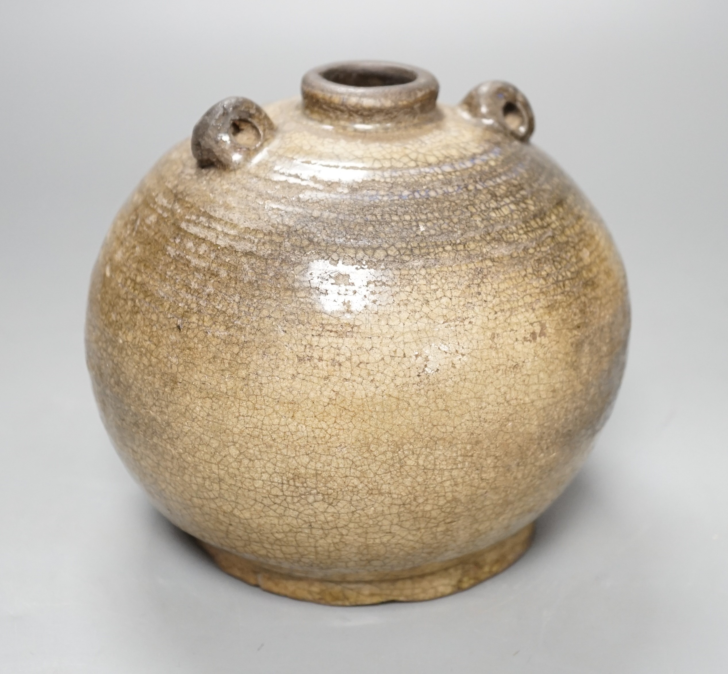 A South East Asian two-handled stoneware jar, possibly Annamese, 15th/16th century, 14cm